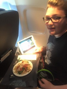 Kanen having dinner in first class on the way home. 